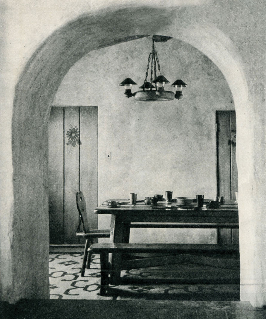 Photo of an arch to the dining room in a house designed by Cliff May.